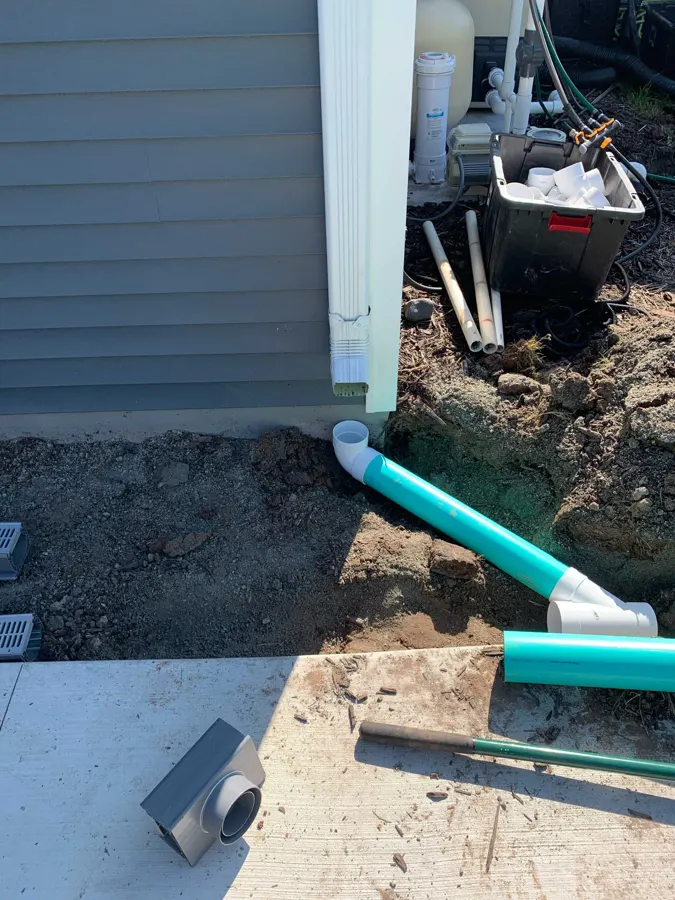 Downspout connections by Greenway LS